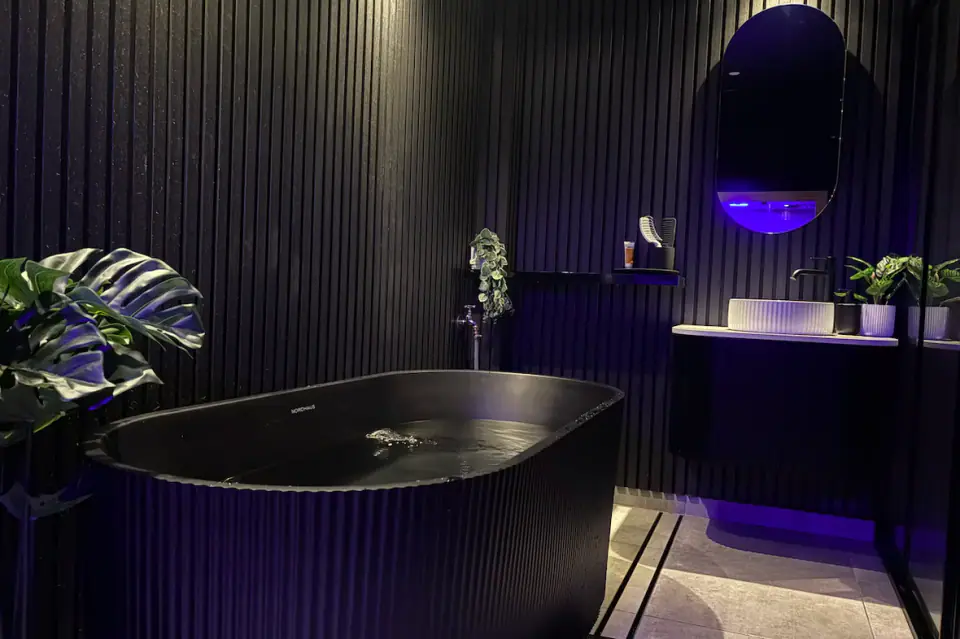 The ice bath tub in the dark, calm wellness room